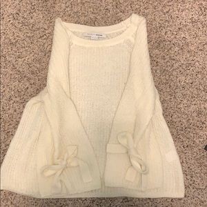 Cream sweater with bows on sleeves!